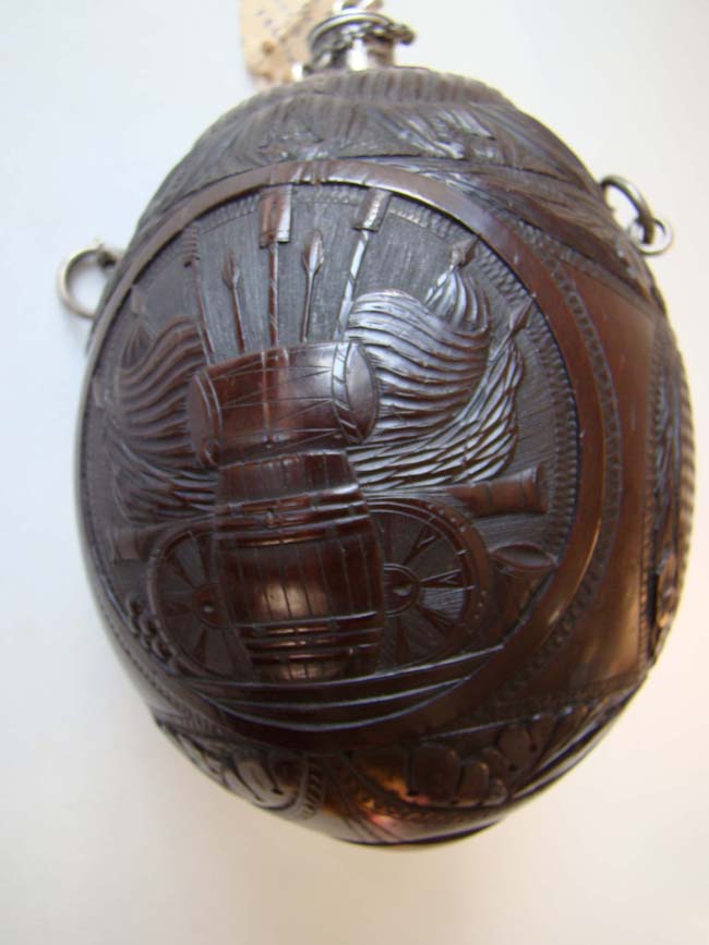 A superbly carved and silver mounted late 18th century Coconut shell gunpowder flask circa 1790 — image 5